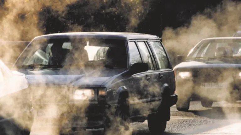 Cars emitting exhaust