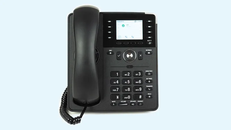 Office desk phone on a light blue background.