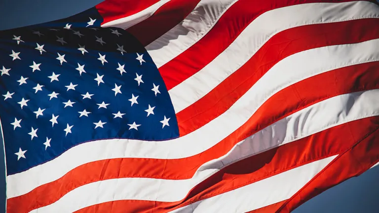 American flag blowing in a breeze.
