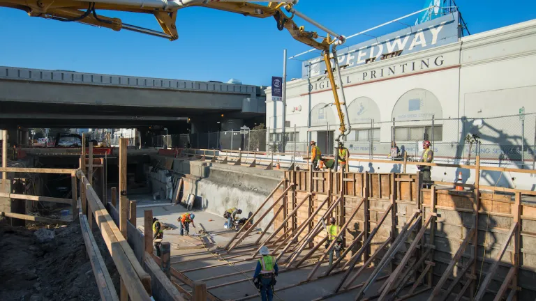 Pouring concrete on Fourth Street in San Francisco as part of the Central Subway Muni expansion project.