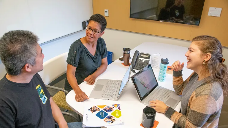 MTC employees meeting in a conference room