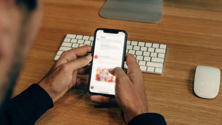 A person looking at their cell phone.