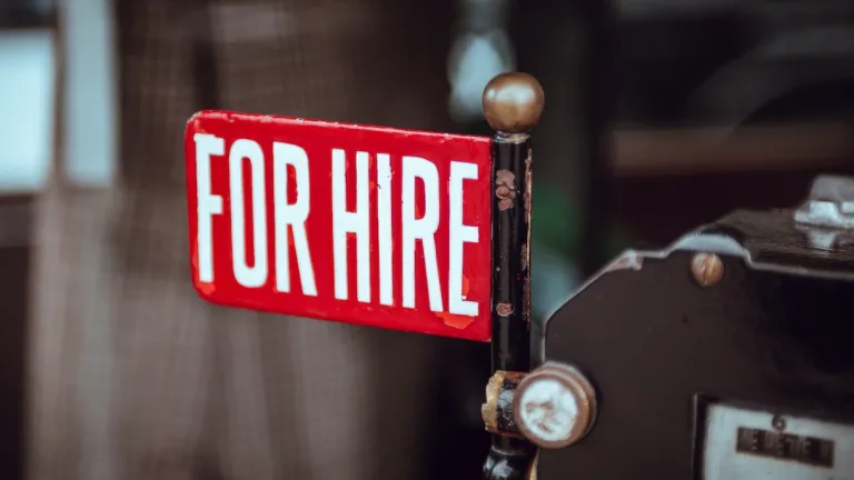 Retro “for hire” sign on a taxi meter.