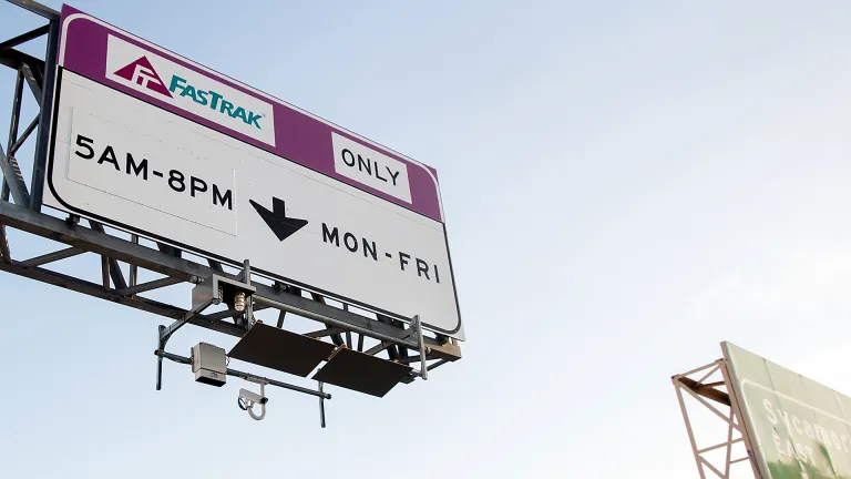 A highway sign indicating FasTrak Only, 5 a.m. to 8 p.m Monday through Friday.