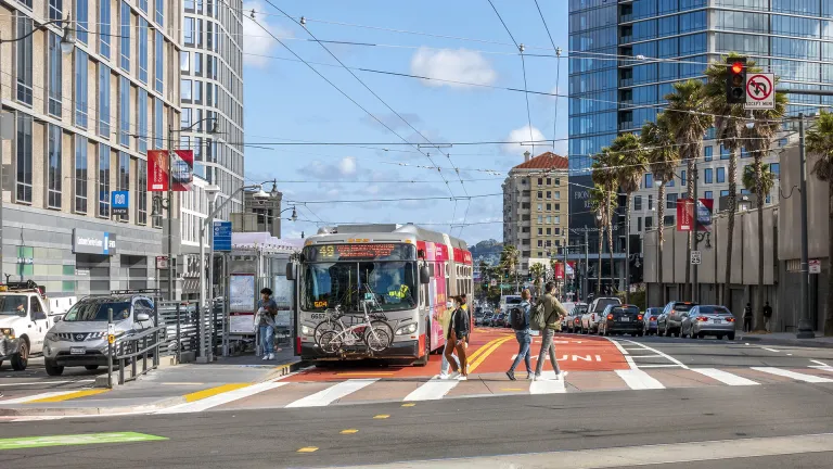 Muni bus in a "bus only" lane in San Francisco.