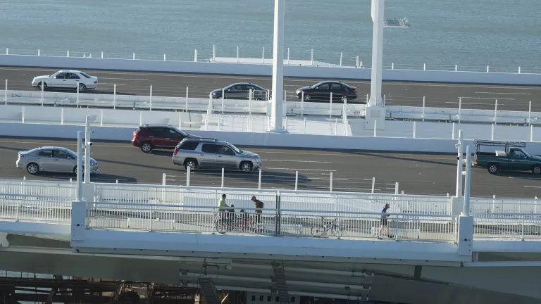 Cyclists take in the view from the path on the San Francisco-Oakland Bay Bridge.