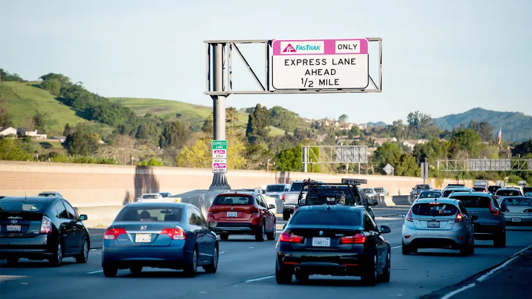 Express Lane ahead sign.