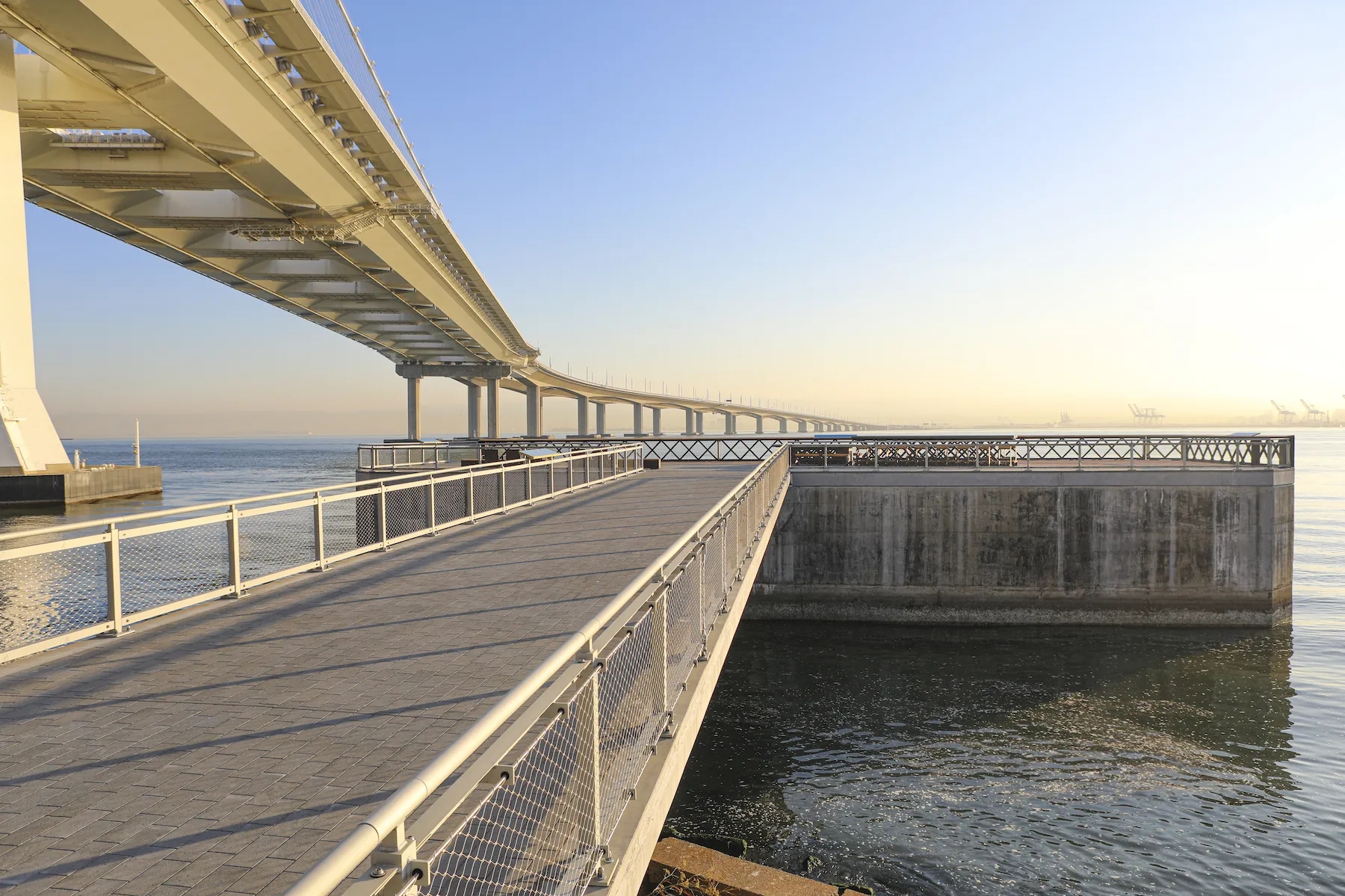 Morning view of the Bimla Rhinehart Vista Point on Yerba Buena Island, with the underneath of the East Span of the Bay Bridge in the background.