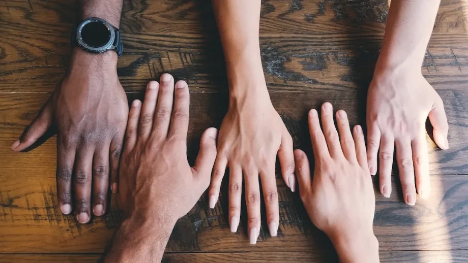 Hands on a table