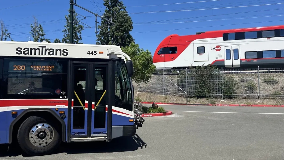 A SamTrans bus and a Caltrain train.