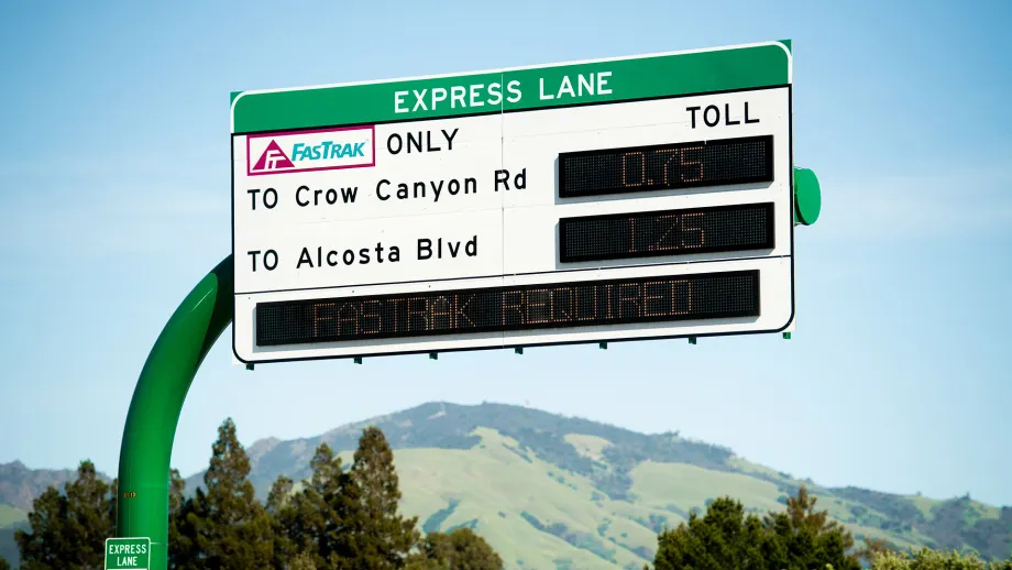 Express Lane sign showing the current price to use the lane.